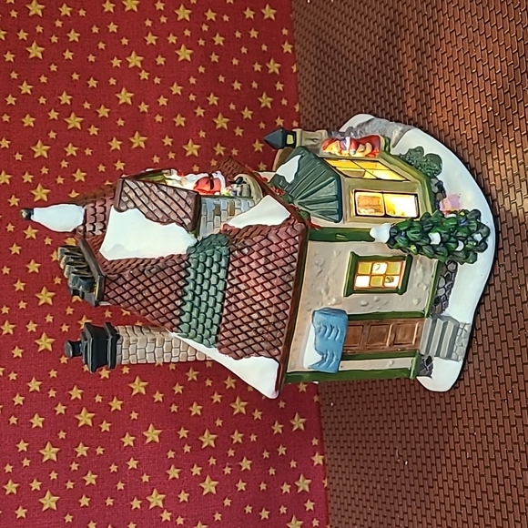 Enchanted Forest Village Santa's Lighted Glass Window Toy Shop - Picture 4 of 11